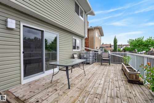 Spacious wood deck with white railing system - 2712 104 Street, Edmonton, AB 