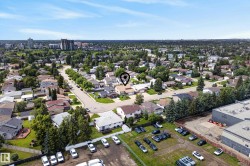 Residential neighborhood featuring a mix of mature trees and single-family homes - 