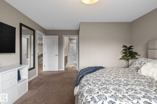 Carpeted room with neutral wall paint and a flush-mount ceiling light - 2146 Koshal Way, Edmonton, AB 