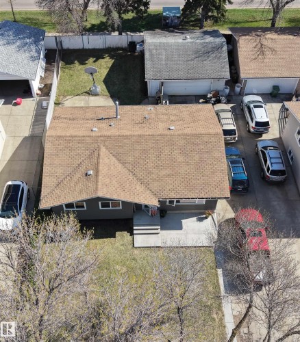 Single-story residence featuring a brown shingle roof and a grey exterior - 45 Lambert Crescent, St. Albert, AB 