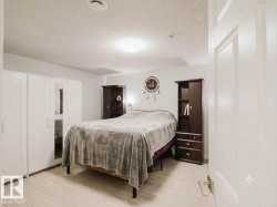 Light-toned wood-finish flooring provides a neutral base for the space - 