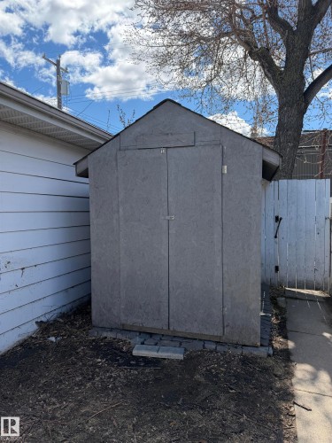 Utility shed featuring a gabled roof and double doors - 7317 83 Avenue, Edmonton, AB 