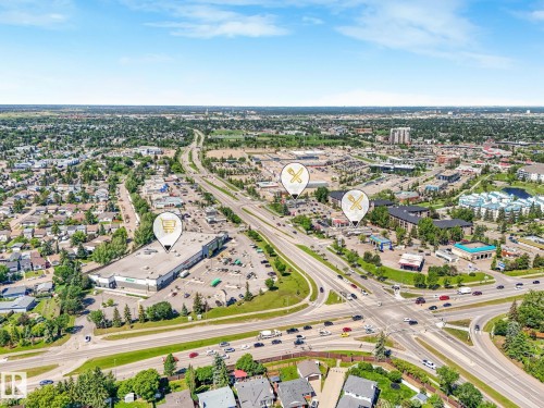 Aerial perspective showcasing a mixed-use urban landscape with commercial and residential areas - 2035 49A Street, Edmonton, AB 
