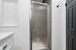 Frosted glass shower enclosure with chrome hardware - 