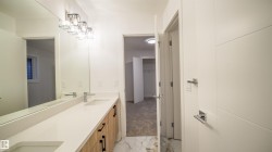 Dual vanity with a white countertop and rectangular undermount sinks - 