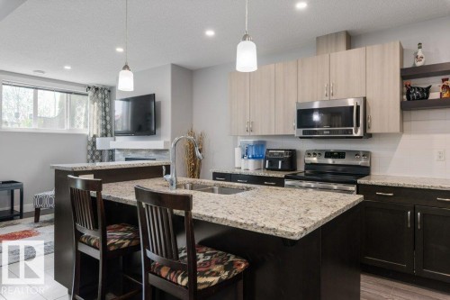24 Elise Place, St. Albert, AB - Indoor Photo Showing Kitchen With Double Sink With Upgraded Kitchen
