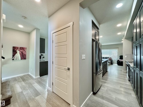 Hardwood-style flooring throughout - 302 Balsam Link, Leduc, AB 