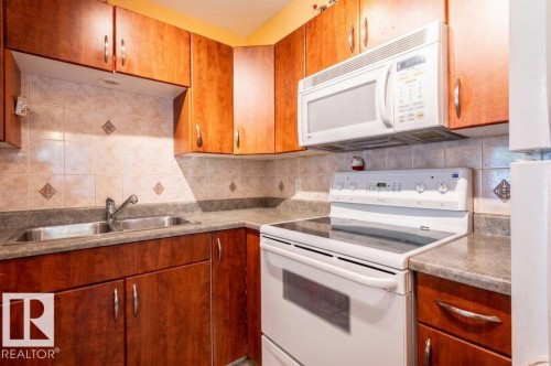 Convenient Over-the-range microwave hood fan. - 303 10528 77 Avenue, Edmonton, AB 