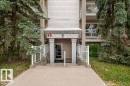 Multi-story residential building with light-colored siding and multiple balconies - 303 10528 77 Avenue, Edmonton, AB 