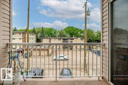 Spacious covered balcony with room for relaxing.  Practical Deck box is included. - 303 10528 77 Avenue, Edmonton, AB 
