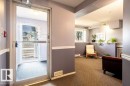 Entryway with a glass-paneled door, and security door & secure entry system. - 303 10528 77 Avenue, Edmonton, AB 