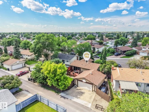 Aerial property overview featuring a shingled roof, attached garage, and a rear deck - 17237 104 Street, Edmonton, AB 