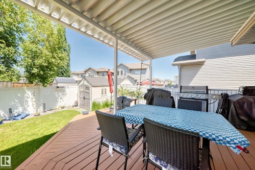 Expansive wooden deck with a covered patio structure - 12410 171A Avenue, Edmonton, AB 