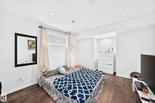 Room featuring wood-finish flooring and white walls - 12410 171A Avenue, Edmonton, AB 