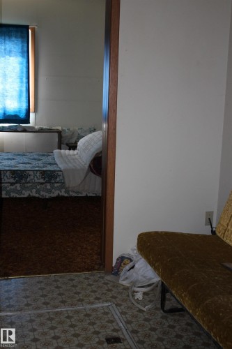 Image quality insufficient for description - 5416 51 Avenue, Andrew, AB - Indoor Photo Showing Bedroom