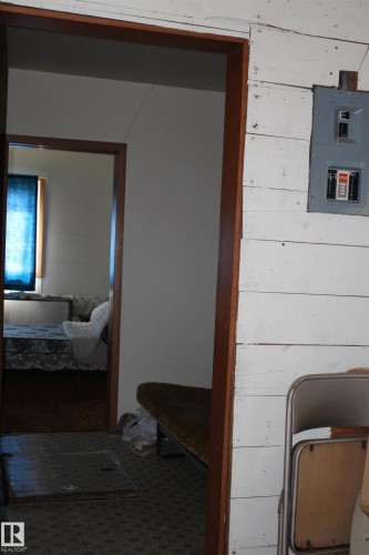 Image quality insufficient for description - 5416 51 Avenue, Andrew, AB - Indoor Photo Showing Bedroom