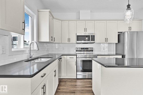 4803 53 Avenue, Thorsby, AB - Indoor Photo Showing Kitchen With Double Sink With Upgraded Kitchen