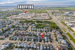 Aerial perspective showcasing a residential neighborhood with varied housing styles - 