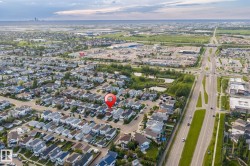 Aerial perspective showcasing a residential neighborhood with varied housing styles - 