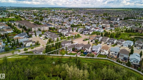 Aerial perspective showcasing a residential neighborhood with varied housing styles - 704 Wildwood Point(E), Edmonton, AB 