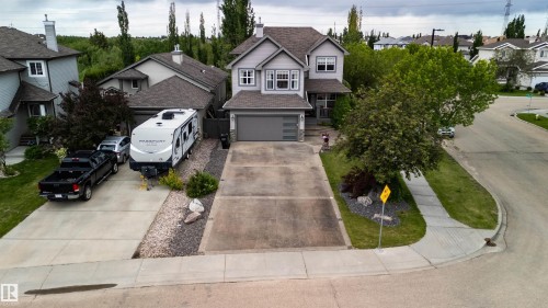Two-story property with gray siding and white trim - 704 Wildwood Point(E), Edmonton, AB 