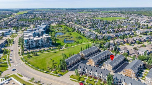 Aerial perspective showcasing a residential community with varied architectural styles - 29 1150 Windermere Way, Edmonton, AB 