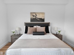 White walls with light wood-finish flooring - 