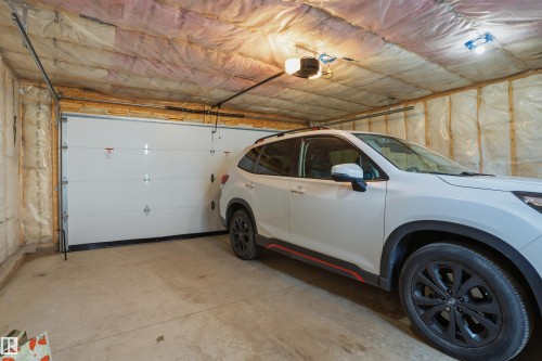 4373 37 Street, Beaumont, AB - Indoor Photo Showing Garage