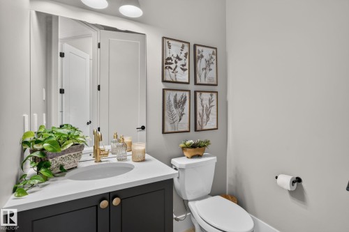 Modern vanity with a white countertop and oval undermount sink - 14 Jane Point(E), St. Albert, AB 
