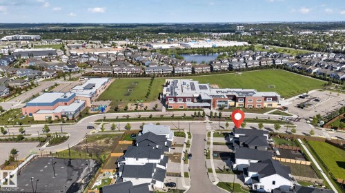 Modern residential development featuring contemporary homes with dark roofs - 14 Jane Point(E), St. Albert, AB 