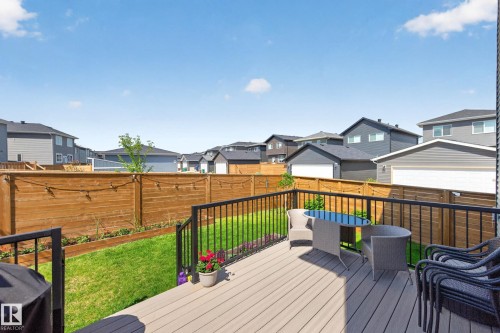 Composite deck with black metal railings - 30 Rosewood Way, St. Albert, AB 