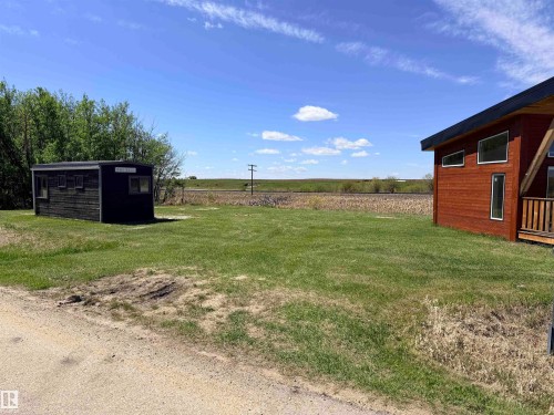 Expansive grassy lot featuring two distinct structures - 50 Ave. 52 St., Rural Westlock County, AB 