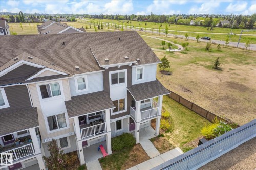 Multi-level townhouse featuring a contemporary exterior with varied siding textures and colors - 47 330 Bulyea Road, Edmonton, AB - Outdoor