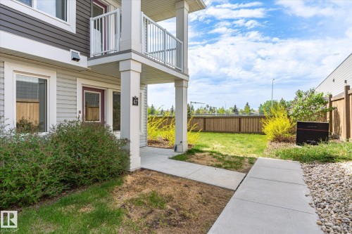 Ground-level entry with a covered porch and dedicated concrete walkway - 47 330 Bulyea Road, Edmonton, AB - Outdoor With Balcony