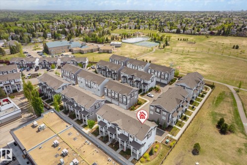 Contemporary townhouse development featuring multi-story units with private balconies and attached garages - 47 330 Bulyea Road, Edmonton, AB -  With View