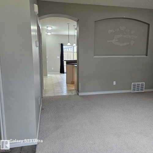 Archway entry to additional living spaces - 99 13825 155 Avenue, Edmonton, AB 