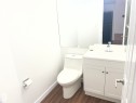 Bathroom featuring a white vanity with silver hardware, an integrated sink, and a chrome faucet - 2 1295 Carter Crest Road, Edmonton, AB  - Indoor Photo Showing Bathroom 