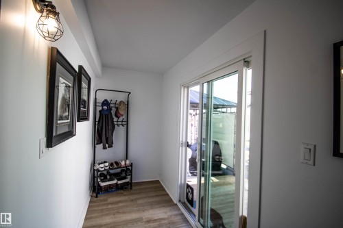 Sliding glass door leading to the exterior - 5217 47 Ave, St. Paul Town, AB 