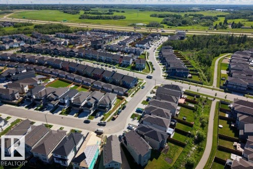 Aerial perspective of a developed residential community with diverse home exteriors - 2116 Maple Road, Edmonton, AB 