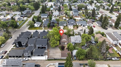 Aerial perspective showcasing the property with surrounding residential streets and mature trees - 9821 153 Street, Edmonton, AB - Outdoor With View