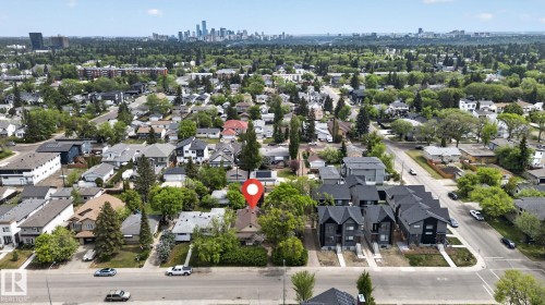 Aerial perspective of a residential neighborhood with a distant cityscape - 9821 153 Street, Edmonton, AB - Outdoor With View