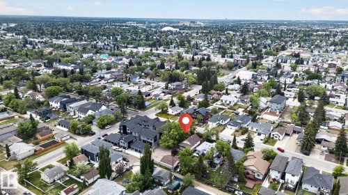 Aerial perspective showcasing a residential neighborhood with a mix of established homes and newer developments - 9821 153 Street, Edmonton, AB - Outdoor With View