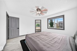Bright room featuring neutral walls and light-toned flooring - 