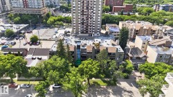 Urban residential landscape with a mix of building types and mature trees - 