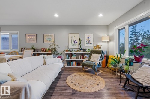 Main floor living room with recessed lighting throughout - 10328 73 Street, Edmonton, AB 