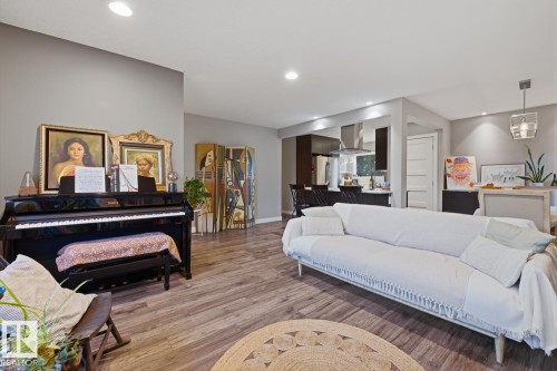 Main floor living room with recessed lighting throughout - 10328 73 Street, Edmonton, AB 