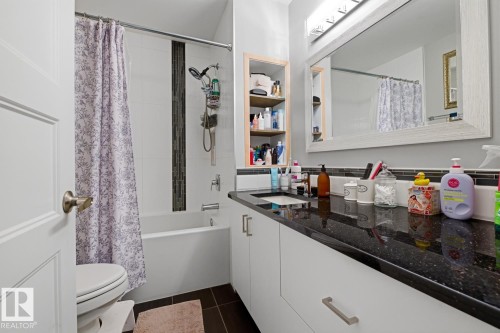 Bathroom a contrasting and expansive quartz countertop - 10328 73 Street, Edmonton, AB 