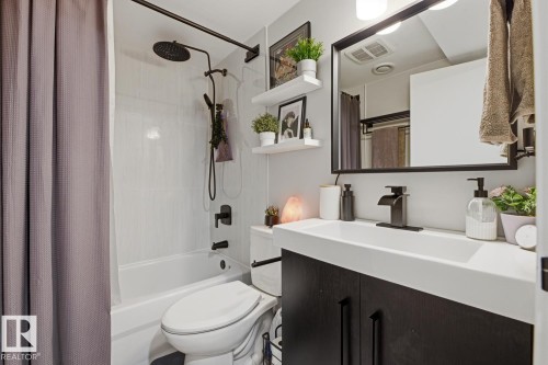Basement bathroom modern finishes with black hardware and finishes - 10328 73 Street, Edmonton, AB 