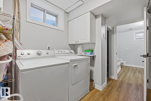 Laundry for main floor suite within large mechanical room and additional storage space - 10328 73 Street, Edmonton, AB 