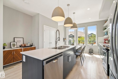 #118 1304 Rutherford Rd Sw, Edmonton, AB - Indoor Photo Showing Kitchen With Stainless Steel Kitchen With Double Sink With Upgraded Kitchen